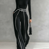 Veronika - tento priliehavý, vysoko uzavretý elegantný overal