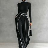 Veronika - tento priliehavý, vysoko uzavretý elegantný overal