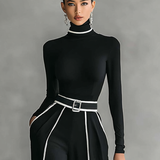Veronika - tento priliehavý, vysoko uzavretý elegantný overal