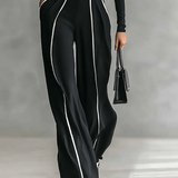 Veronika - tento priliehavý, vysoko uzavretý elegantný overal