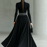 Čierne Maxikleid s Bielymi Švami, Vysokým Golierom, Dlhými Rukávmi a Tvarovaným Strihom