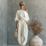 Off-White dámsky ľanový set s off-shoulder topom a tapered nohavicami